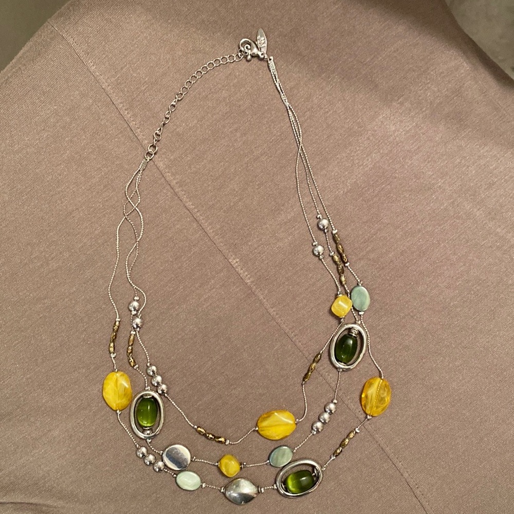 Multi-strand necklace.  Silver with green, golden yellow stones. NY Collection
